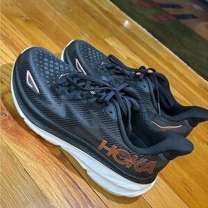 Hoka Clifton 9, women’s size 10, black and rose gold color, worn twice